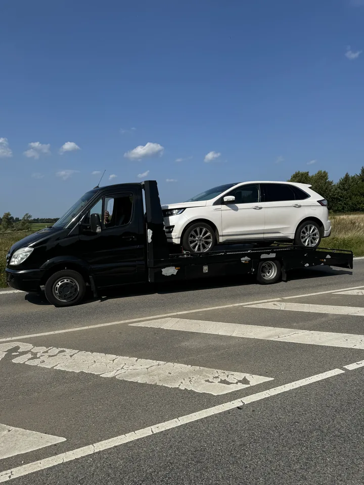Ford transporteret sikkert på lad